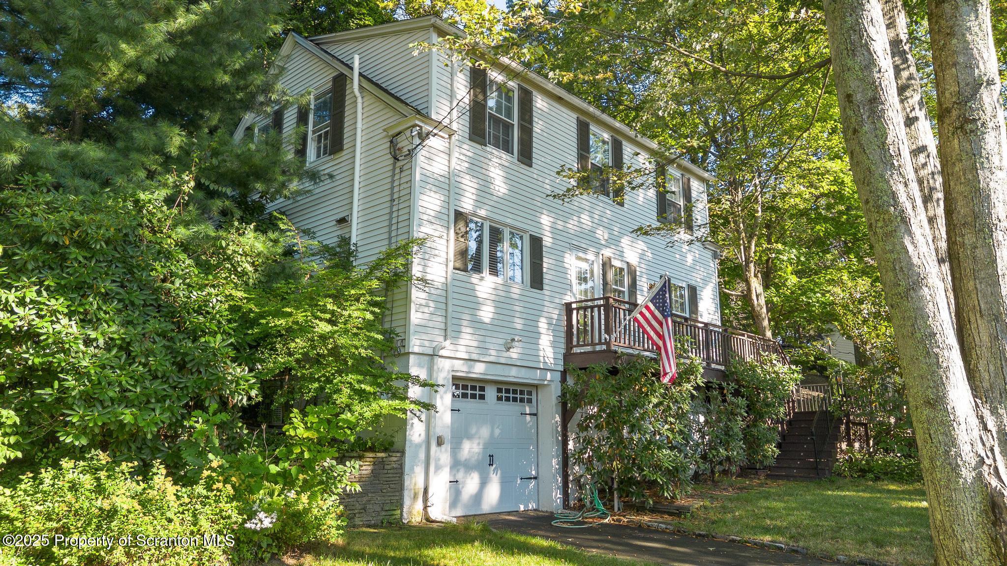 111 Upper Knapp Road Clarks Summit, PA 18411 - Photo 38 of 52 a view of a house with a yard and plants