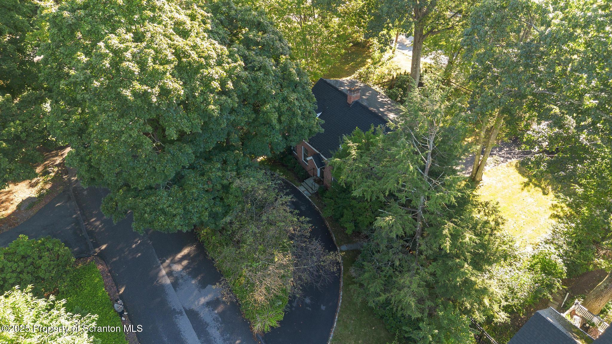 111 Upper Knapp Road Clarks Summit, PA 18411 - Photo 40 of 52 an aerial view of house with yard and outdoor seating