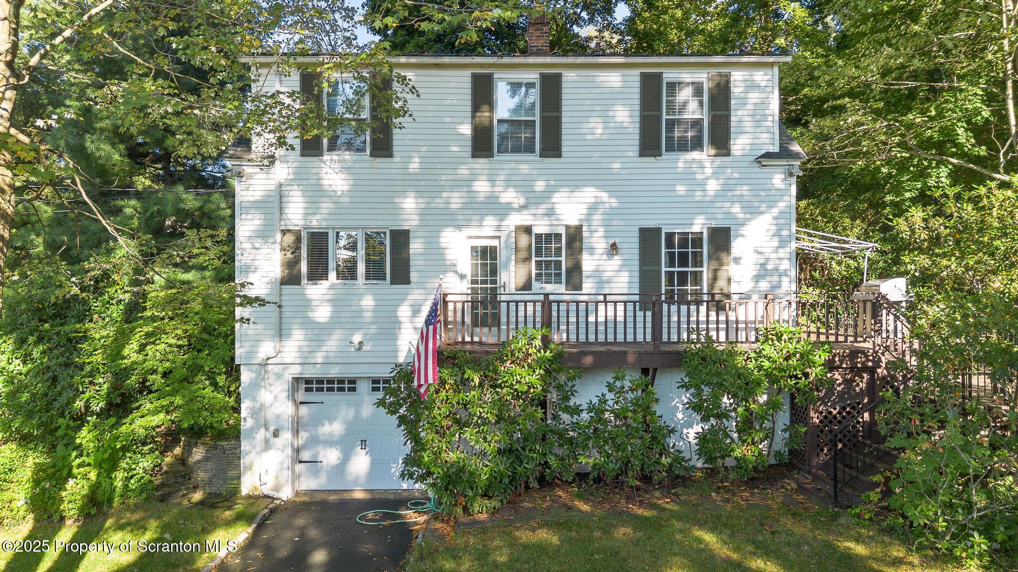 111 Upper Knapp Road Clarks Summit, PA 18411 - Photo 42 of 52 a view of a brick building next to a yard