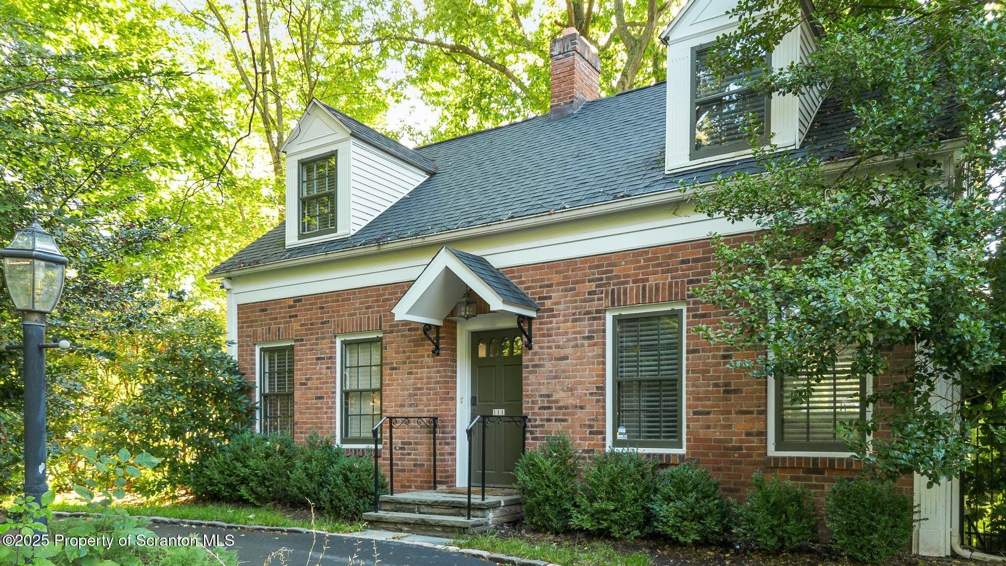 111 Upper Knapp Road Clarks Summit, PA 18411 - Photo 46 of 52 a front view of a house with plants