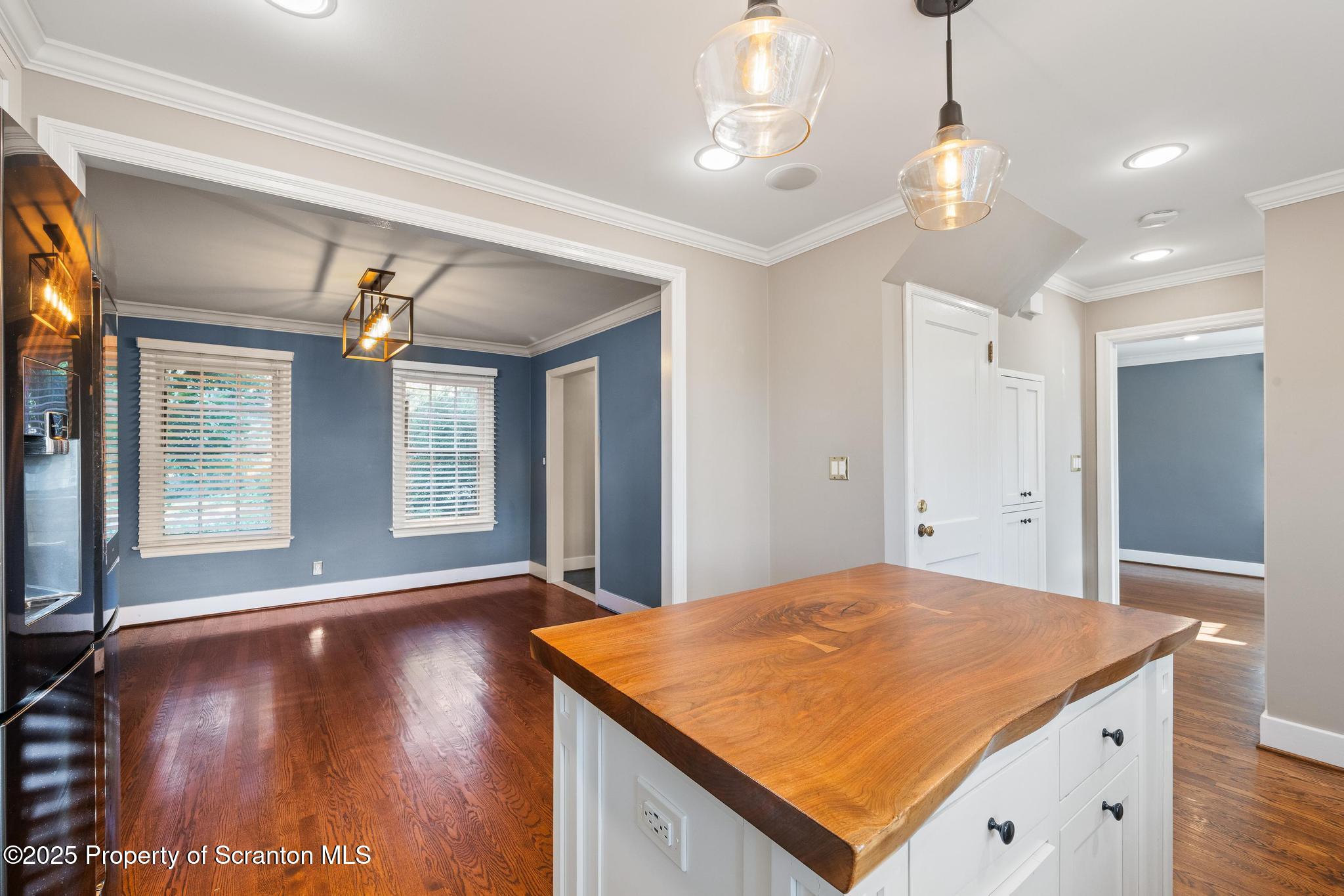 111 Upper Knapp Road Clarks Summit, PA 18411 - Photo 8 of 52 a bedroom with a bed and a large window