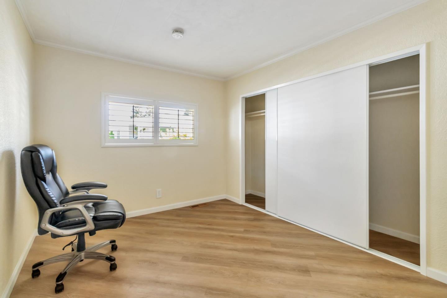 3263 Vineyard, Unit 132 Pleasanton, CA 94566 - Photo 14 of 34 a view of a workspace with furniture and a window