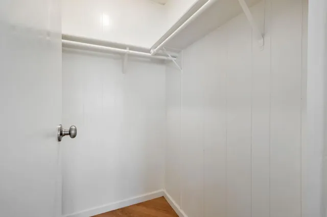 a view of a room with rack on the wall