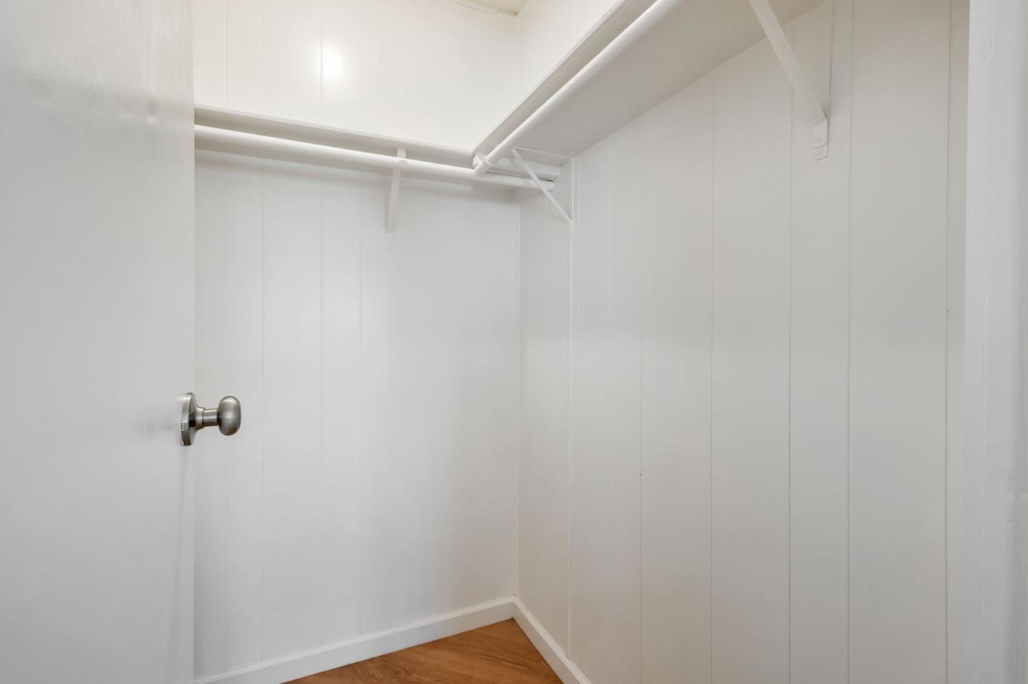 3263 Vineyard, Unit 132 Pleasanton, CA 94566 - Photo 19 of 34 a view of a room with rack on the wall