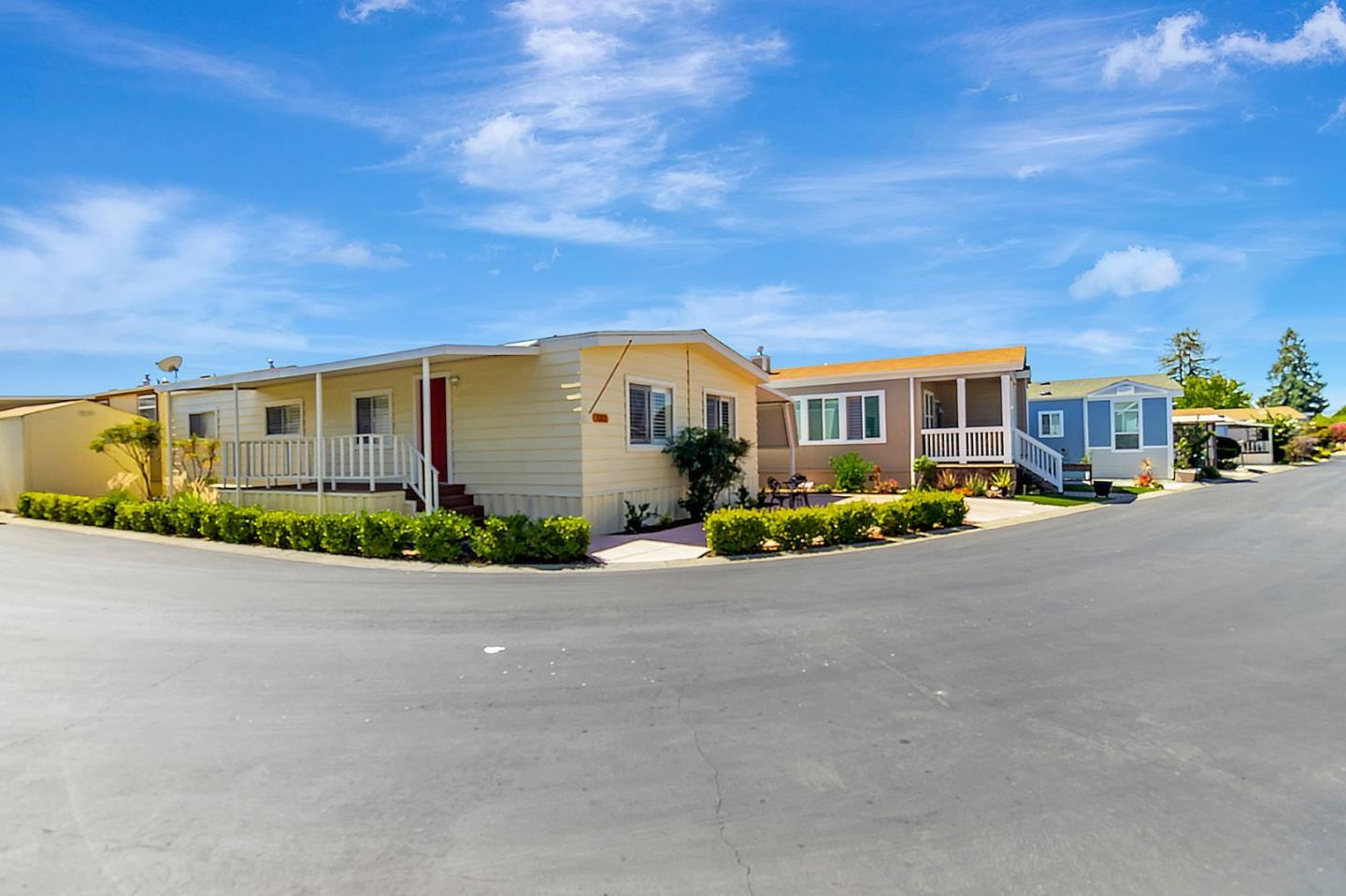 3263 Vineyard, Unit 132 Pleasanton, CA 94566 - Photo 2 of 34 a view of a street with a house