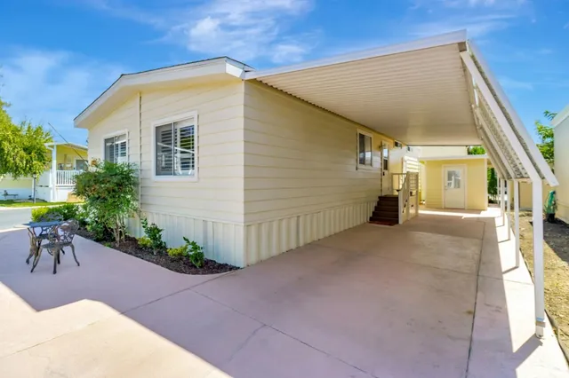 a view of a house with entertaining space
