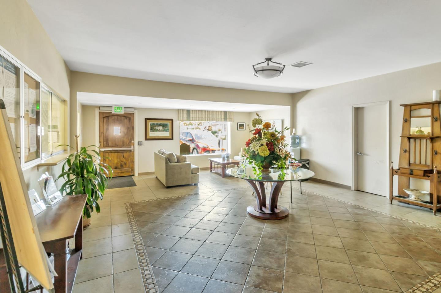 3263 Vineyard, Unit 132 Pleasanton, CA 94566 - Photo 29 of 34 a lobby with furniture and potted plants