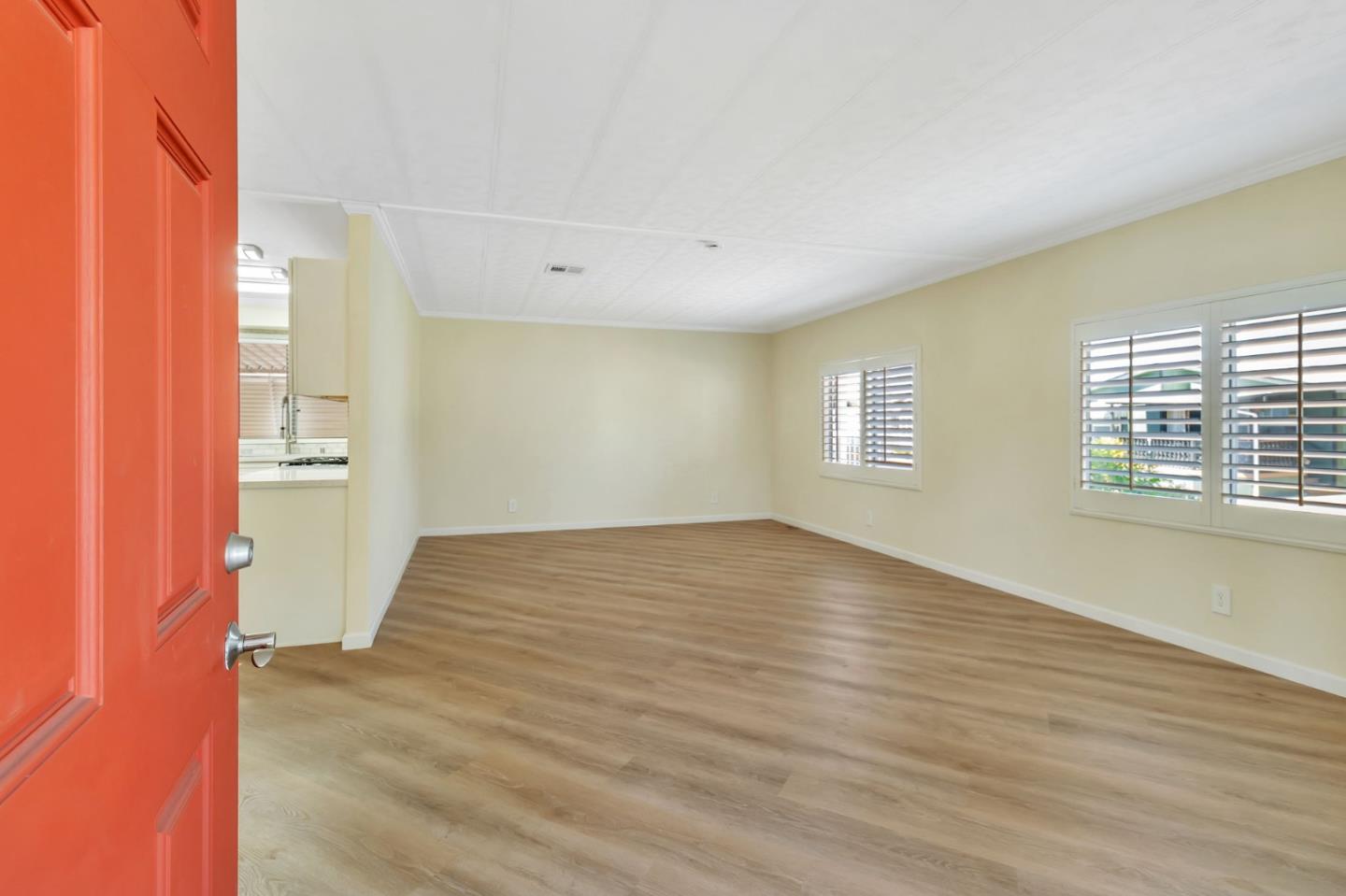 3263 Vineyard, Unit 132 Pleasanton, CA 94566 - Photo 5 of 34 a view of empty room with wooden floor and fan