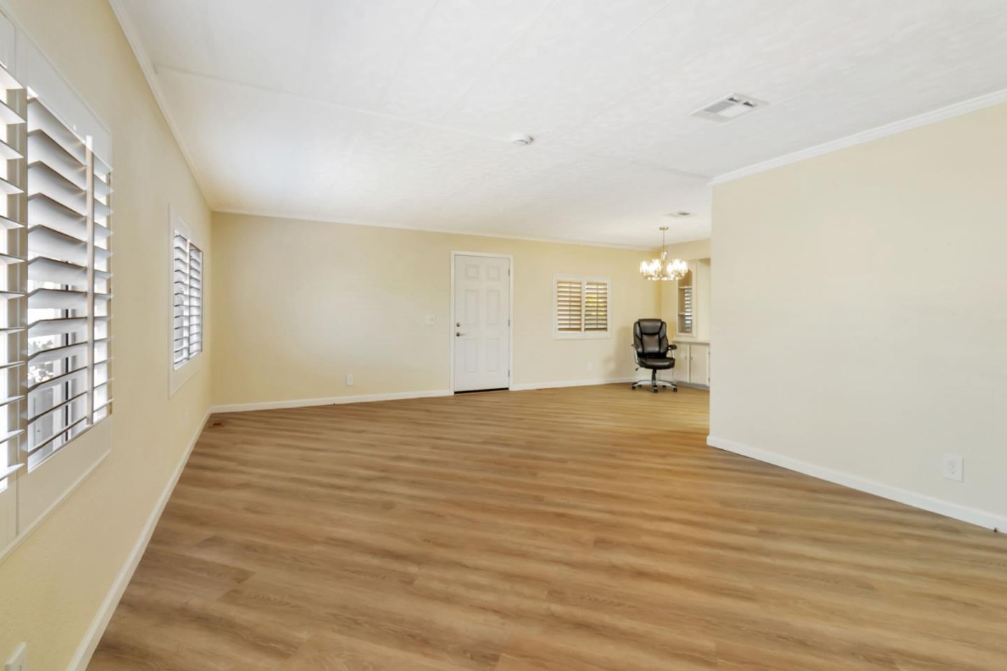 3263 Vineyard, Unit 132 Pleasanton, CA 94566 - Photo 6 of 34 a view of empty room with wooden floor