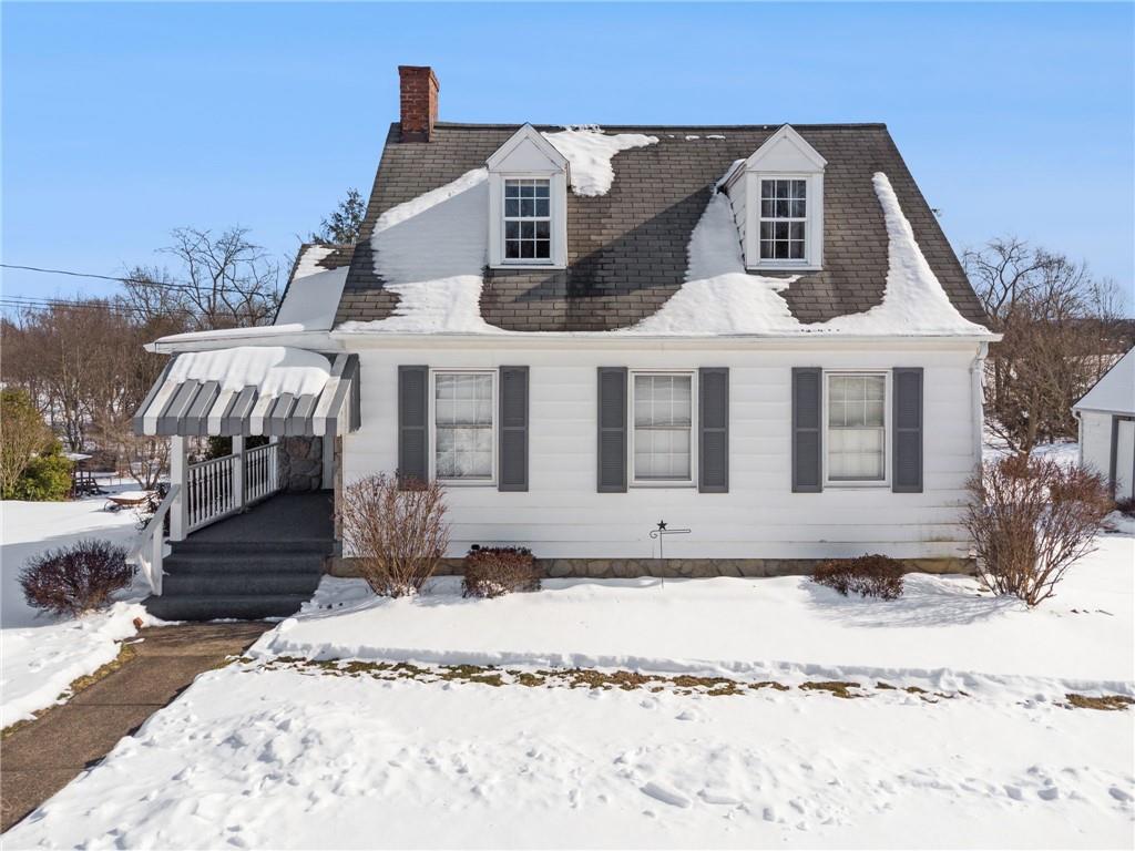 823 Arbor Lane Mount Pleasant, PA 15666 - Photo 2 of 37 a front view of a house with a yard