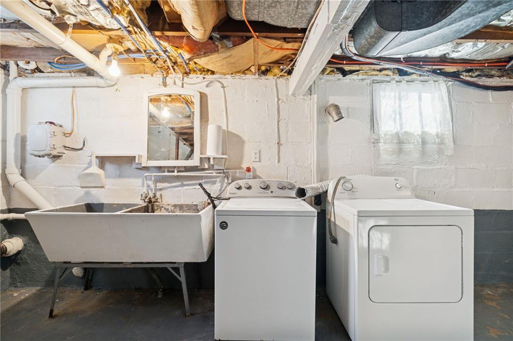 823 Arbor Lane Mount Pleasant, PA 15666 - Photo 26 of 37 a utility room with dryer and washer