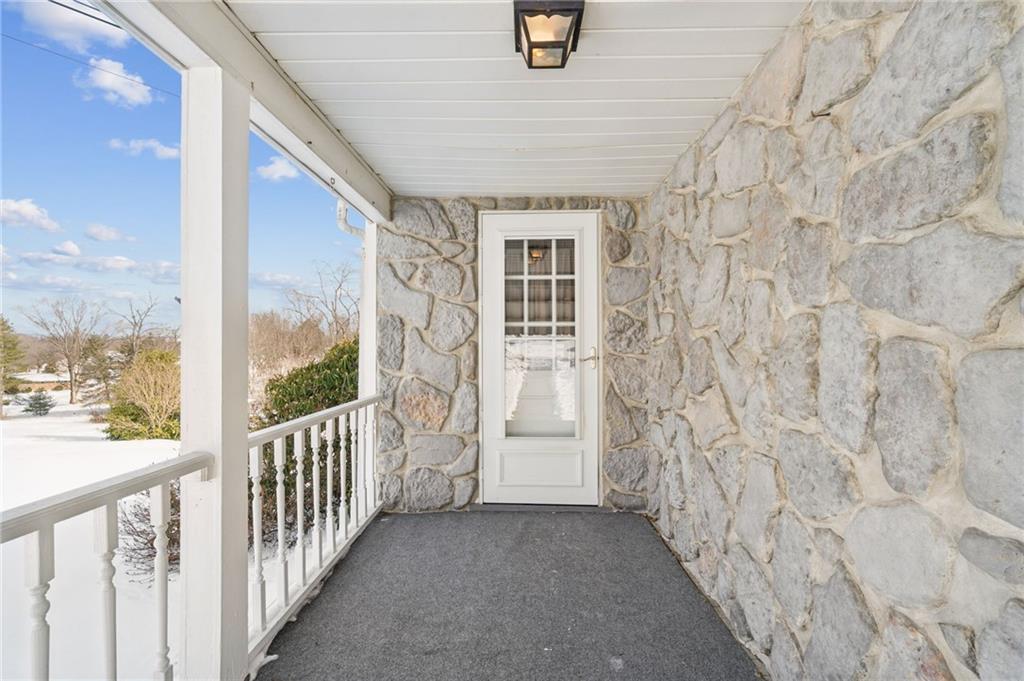 823 Arbor Lane Mount Pleasant, PA 15666 - Photo 3 of 37 a view of a porch with wooden floor