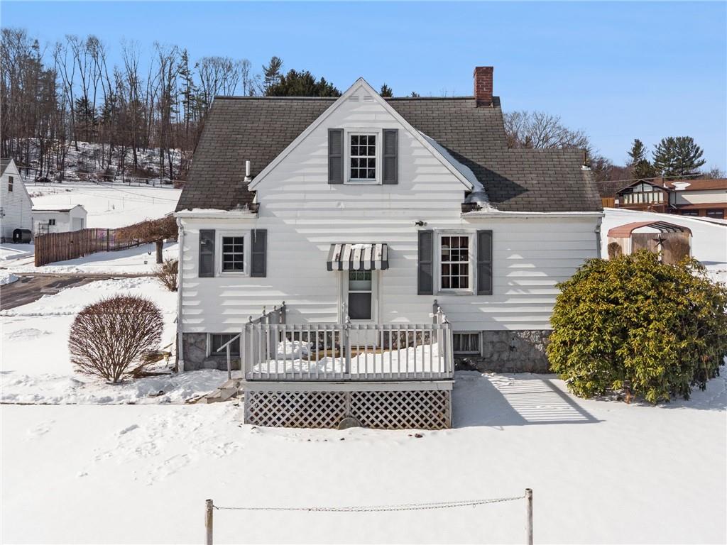 823 Arbor Lane Mount Pleasant, PA 15666 - Photo 32 of 37 a front view of a house with a yard