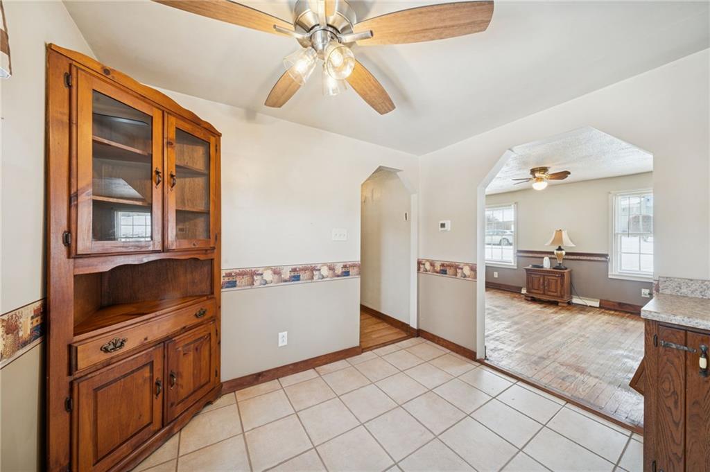 823 Arbor Lane Mount Pleasant, PA 15666 - Photo 8 of 37 a kitchen with stainless steel appliances granite countertop a refrigerator and a stove top oven