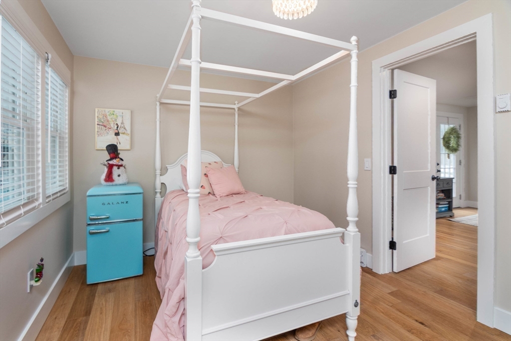 8 Edith Lane Rutland, MA 01543 - Photo 21 of 25 a room with a bed and a wooden floor