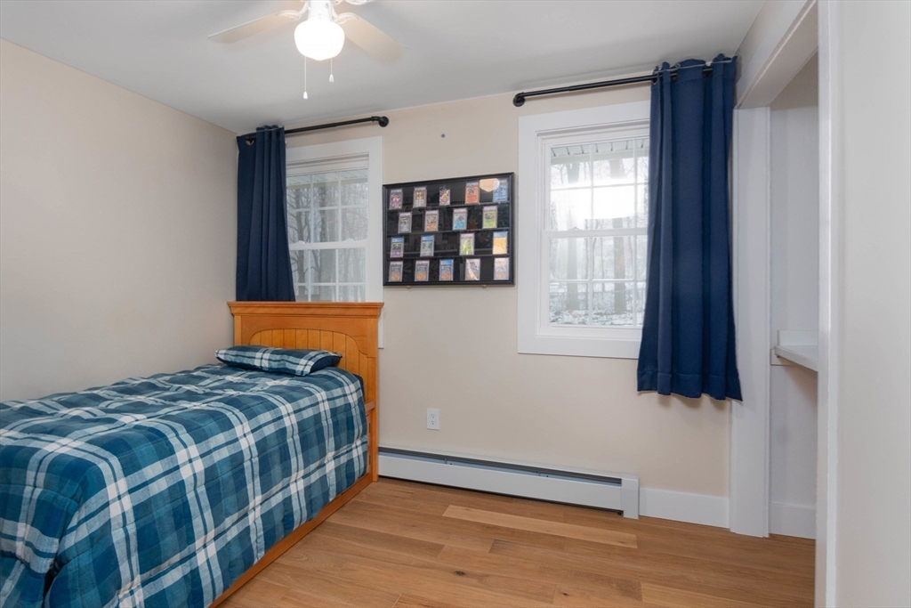 8 Edith Lane Rutland, MA 01543 - Photo 23 of 25 a bedroom with a bed and a window