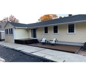 8 Edith Lane Rutland, MA 01543 - Photo 3 of 25 a view of house with backyard and sitting area