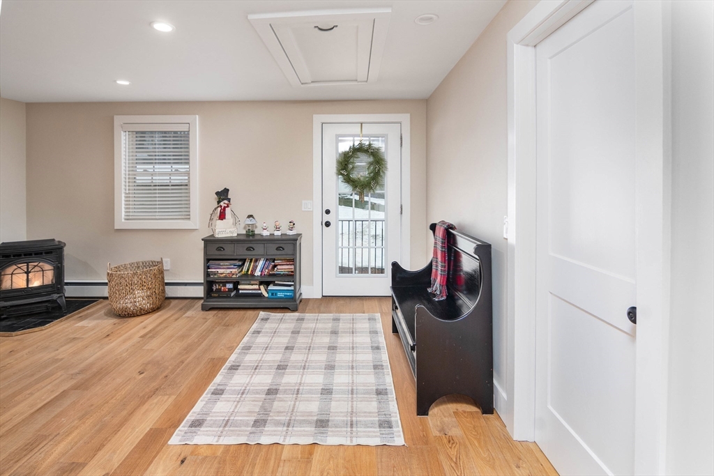 8 Edith Lane Rutland, MA 01543 - Photo 8 of 25 a bedroom with furniture and a fireplace