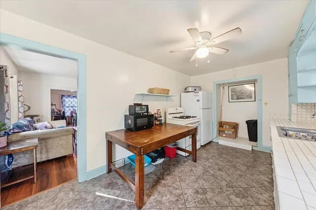 a view of a workspace with furniture and a livingroom