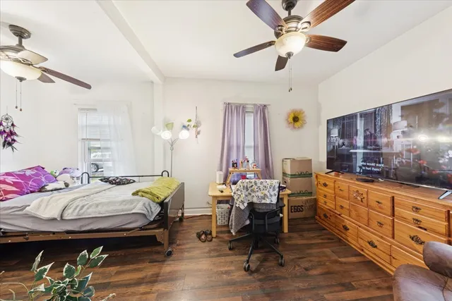 a bedroom with furniture and a bed