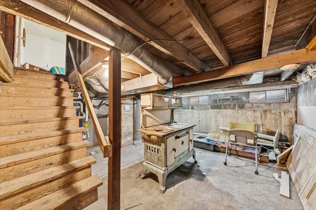 a view of an empty room with windows