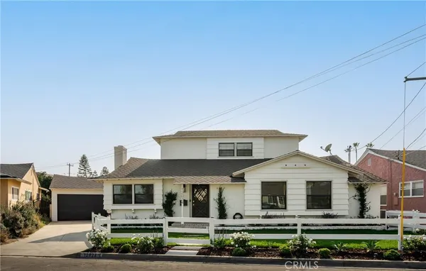 a front view of a house with a porch