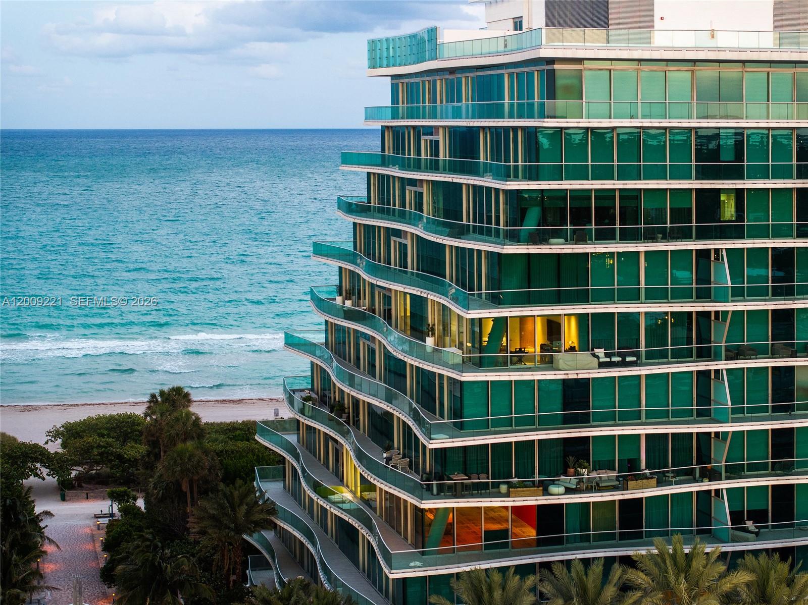 9349 Collins Avenue, Unit 801 Surfside, FL 33154 - Photo 29 of 59 a view of a tall building from a balcony
