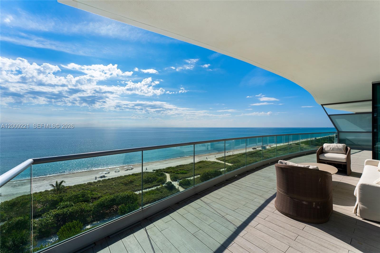 9349 Collins Avenue, Unit 801 Surfside, FL 33154 - Photo 4 of 59 a view of a balcony with an ocean view