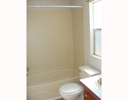 2521 Stanton Drive Corpus Christi, TX 78418 - Photo 9 of 9 a bathroom with a toilet a sink and a shower