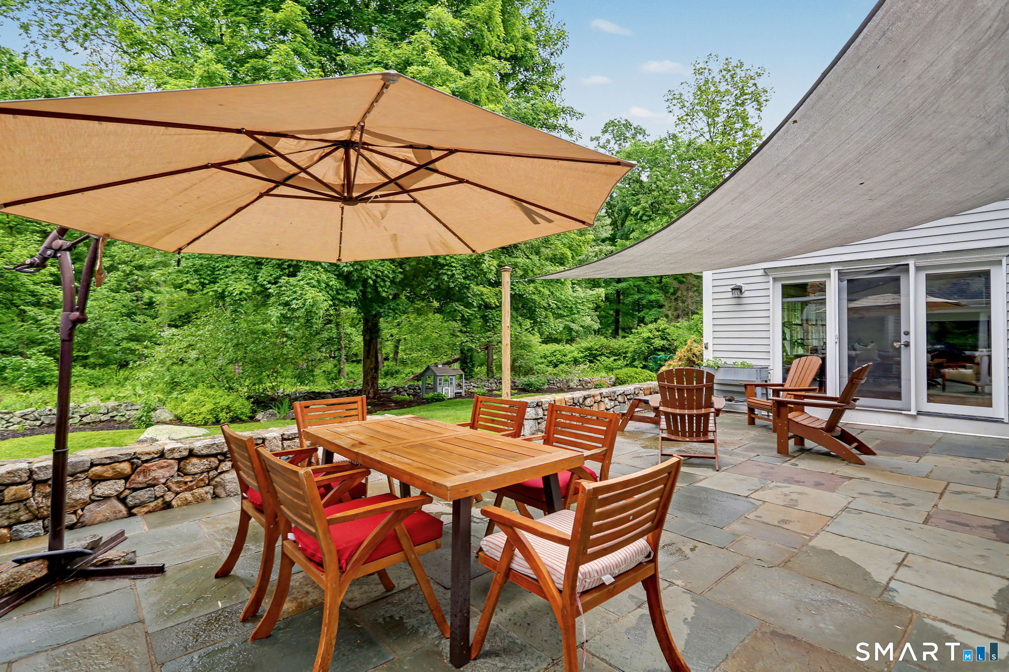 596 Silvermine Road New Canaan, CT 06840 - Photo 32 of 37 Private patio overlooking beautiful acreage