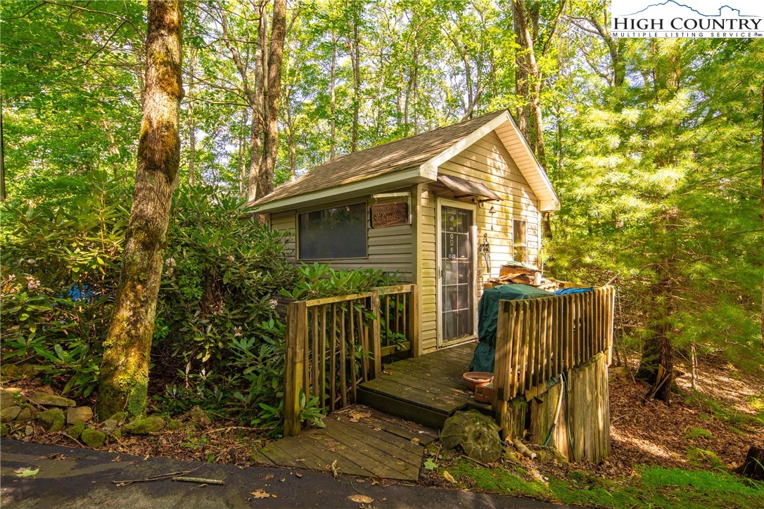1169 Old Hampton Road Boone, NC 28607 - Photo 25 of 49 a view of a house with a yard