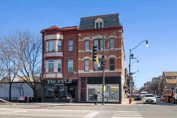 a front view of a building and a street