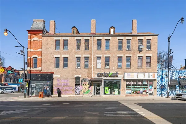 a view of a building and a street