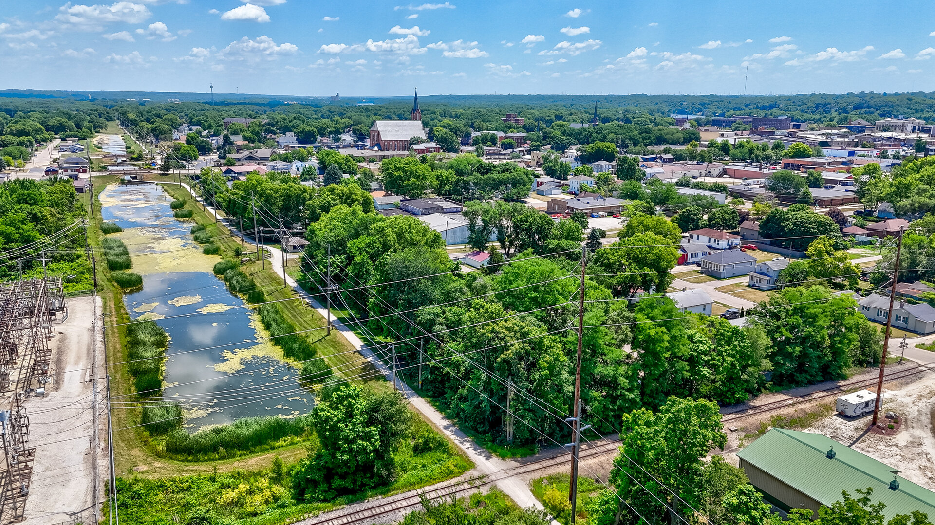 1313 Chestnut Street Ottawa, IL 61350 - Photo 24 of 30 an aerial view of residential houses with outdoor space and trees