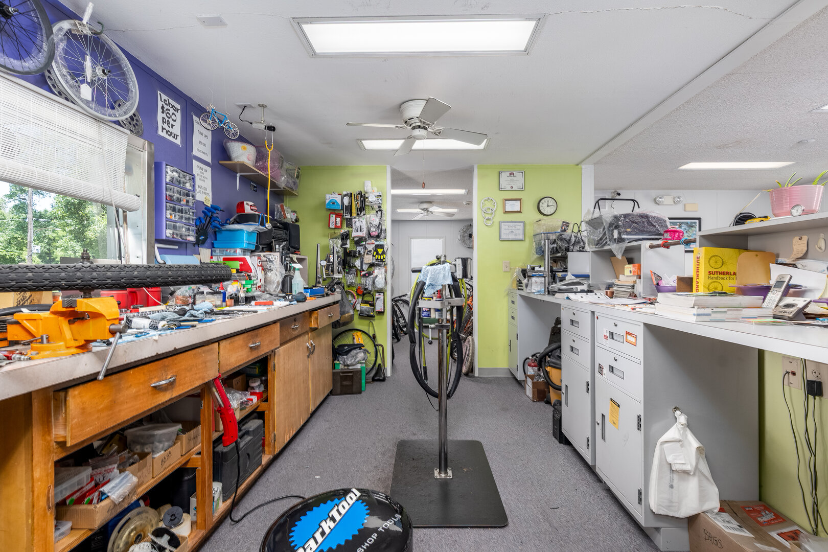 1313 Chestnut Street Ottawa, IL 61350 - Photo 7 of 30 a kitchen filled with stainless steel appliances kitchen island granite countertop lots of clutter and stainless steel appliances
