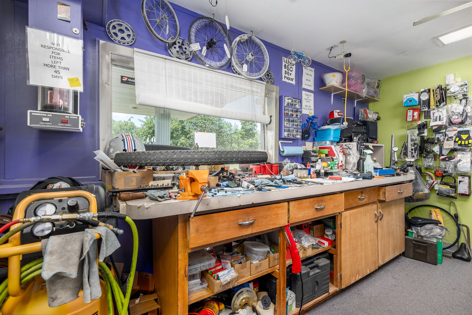 1313 Chestnut Street Ottawa, IL 61350 - Photo 8 of 30 a room with lots of different colored cloths