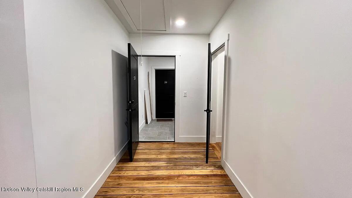 406 Main Street, Unit 2E Catskill, NY 12414 - Photo 20 of 28 a view of a hallway