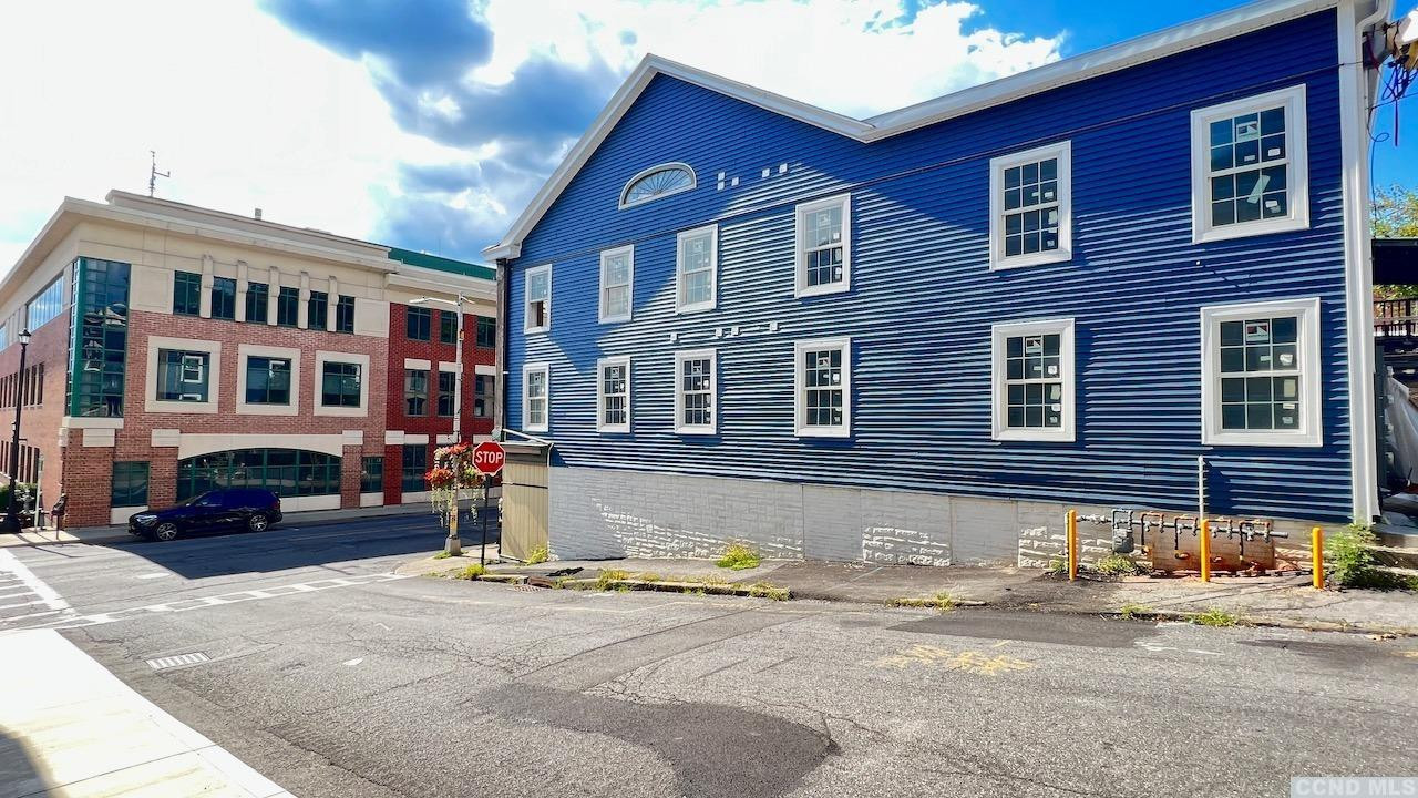 406 Main Street, Unit 2E Catskill, NY 12414 - Photo 26 of 28 a front view of a building with street view