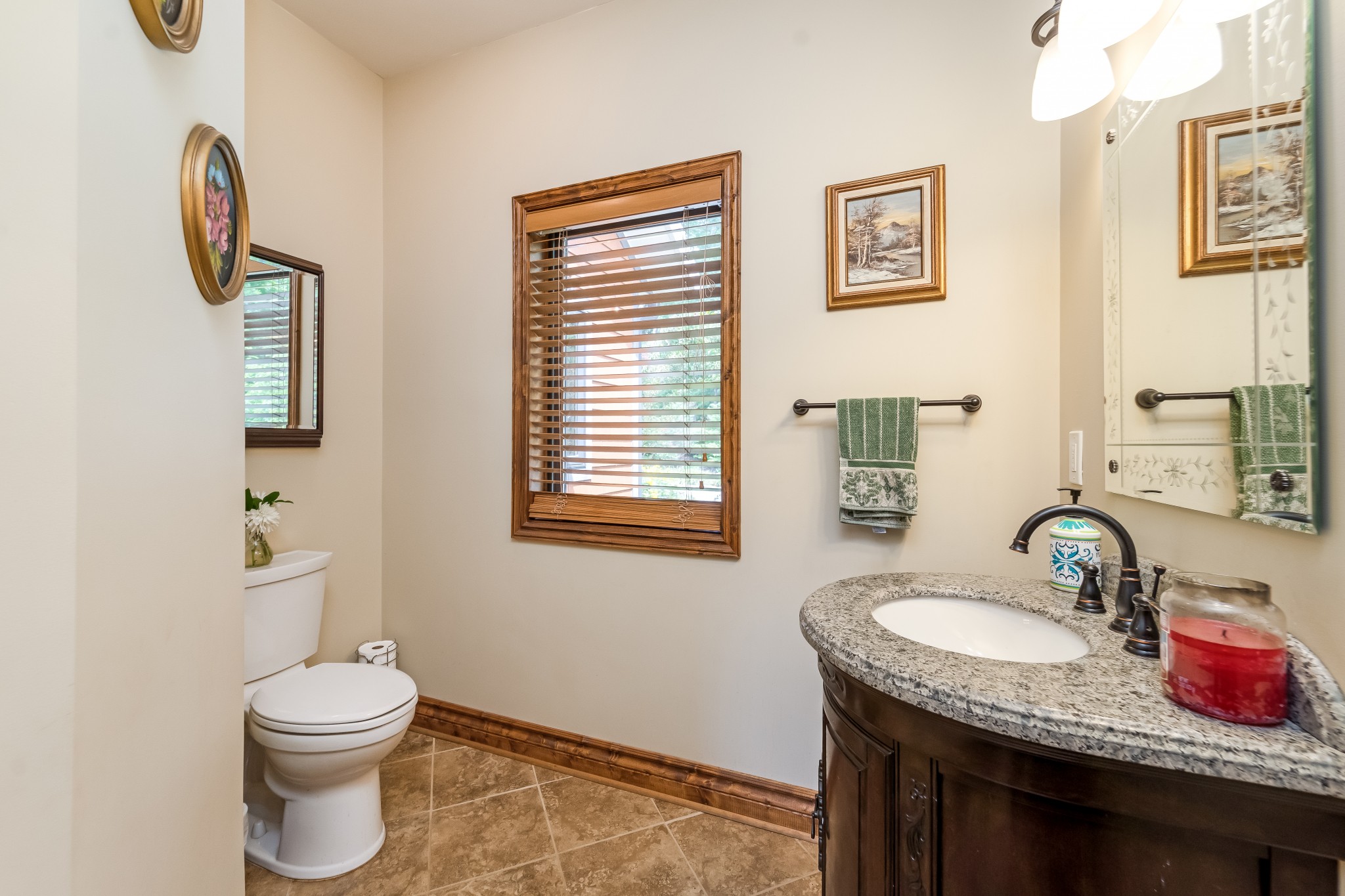 5564 Pinewood Road Franklin, TN 37064 - Photo 23 of 69 a bathroom with a granite countertop sink toilet and a mirror