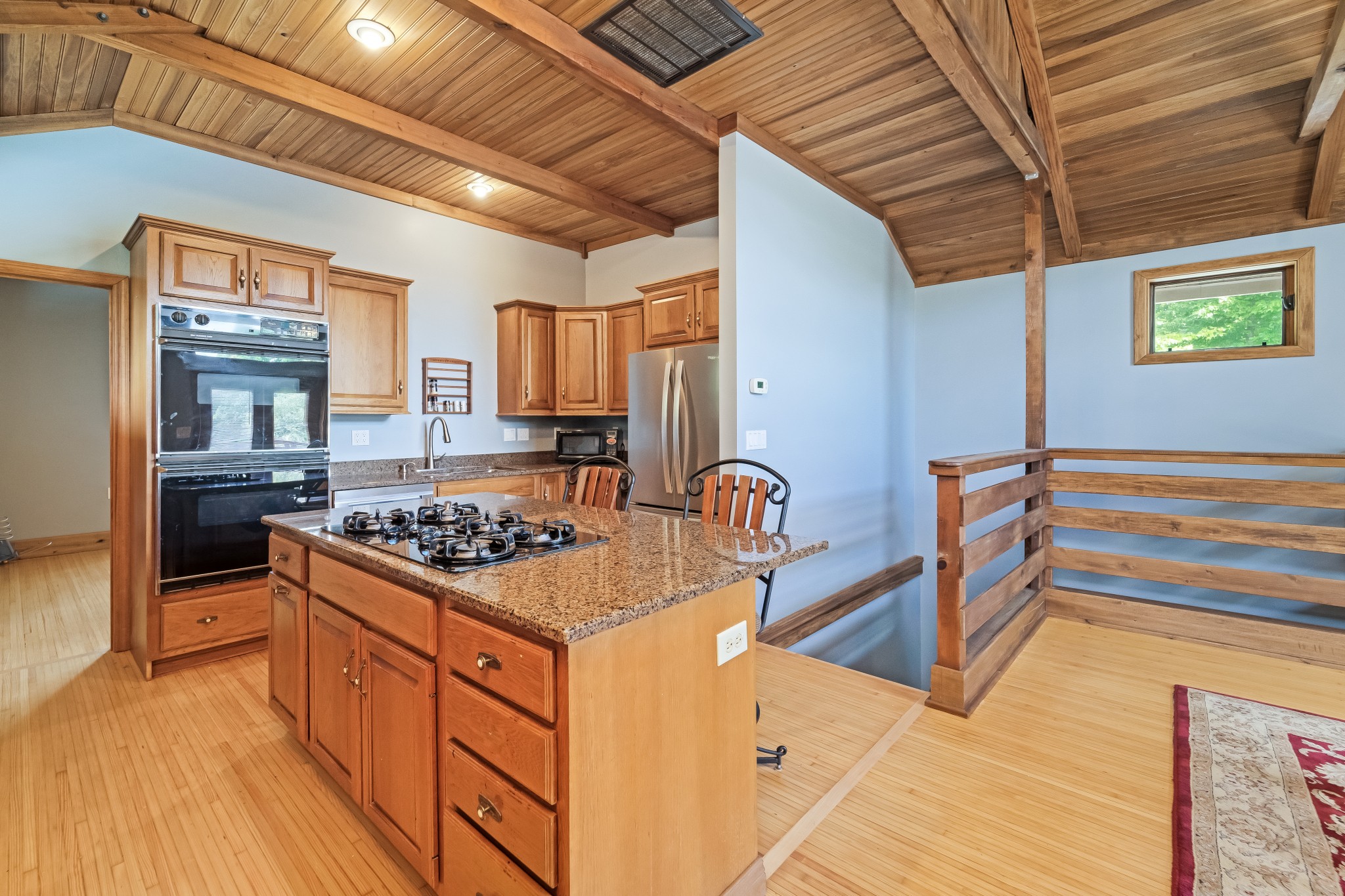 5564 Pinewood Road Franklin, TN 37064 - Photo 47 of 69 a kitchen with stainless steel appliances granite countertop a stove and a sink