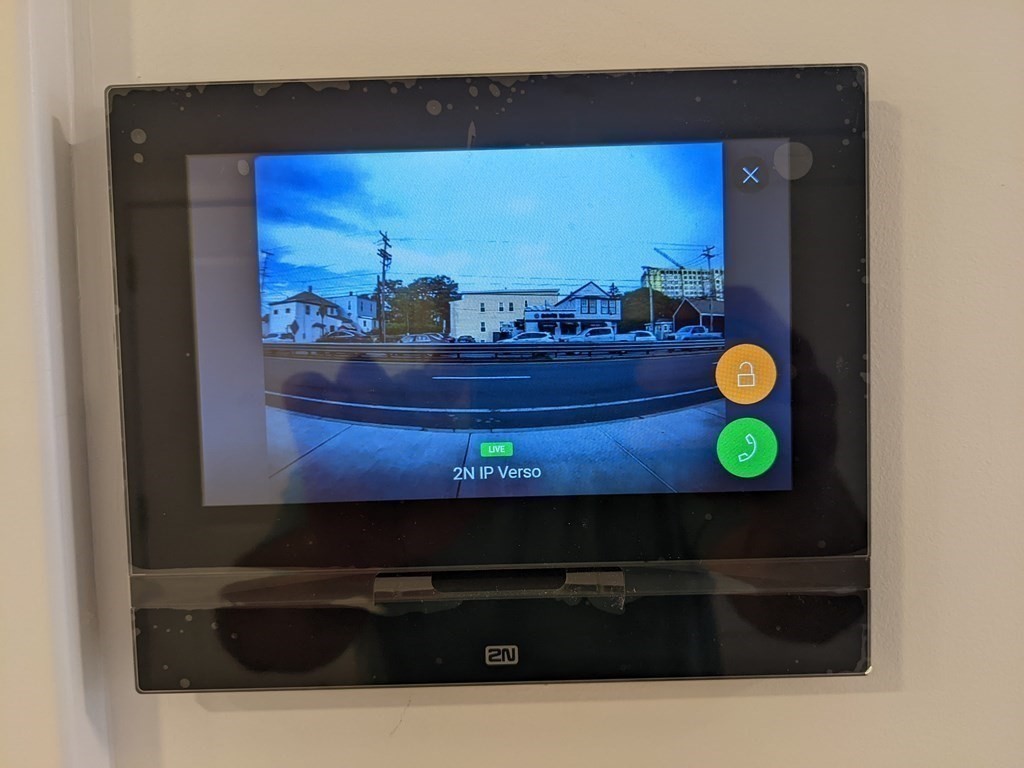 1133 North Shore Road, Unit 205 Revere, MA 02151 - Photo 12 of 20 a view of water heater and wooden floor