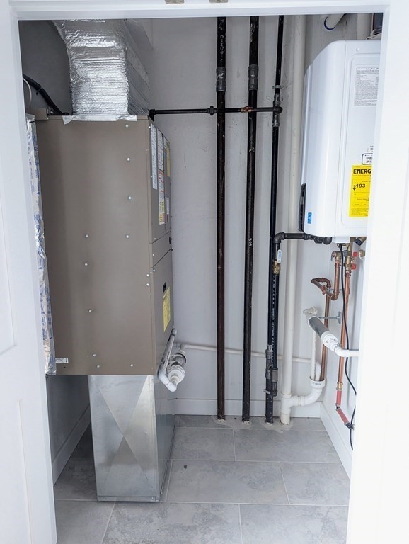 1133 North Shore Road, Unit 205 Revere, MA 02151 - Photo 10 of 20 a view of water heater room