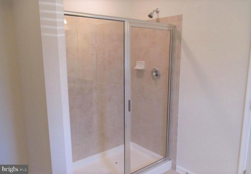 19 Eagle Lane Malvern, PA 19355 - Photo 16 of 20 a bathroom with a glass shower door