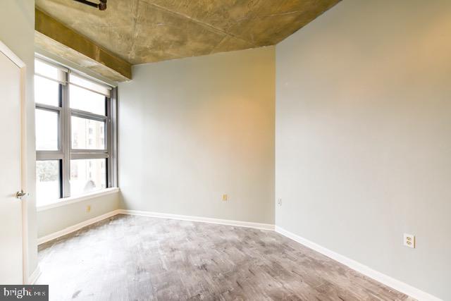1300 N Street Northwest, Unit 508 Washington, DC 20005 - Photo 11 of 19 a view of an empty room with a window