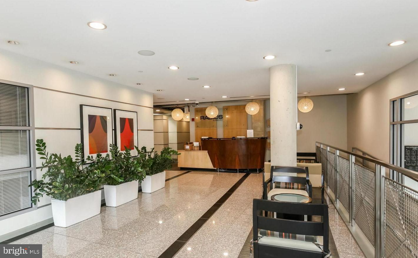 1300 N Street Northwest, Unit 508 Washington, DC 20005 - Photo 15 of 19 a lobby with furniture and potted plants