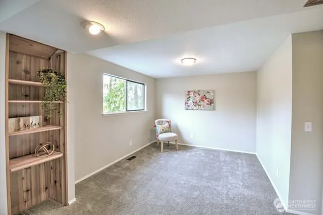 a view of a hallway with closet area