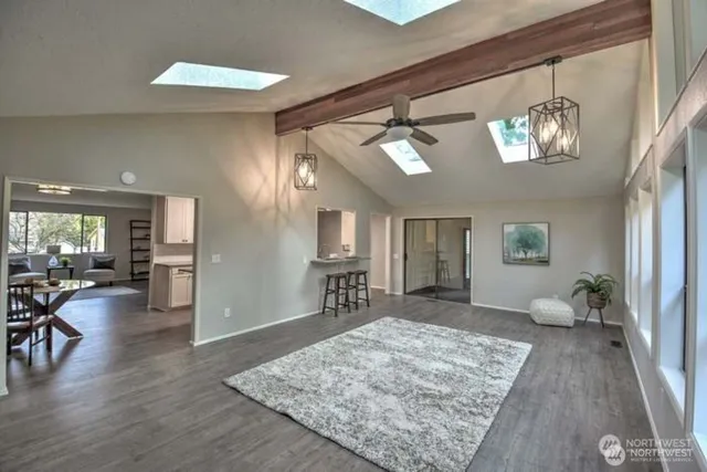 a living room with furniture and a table