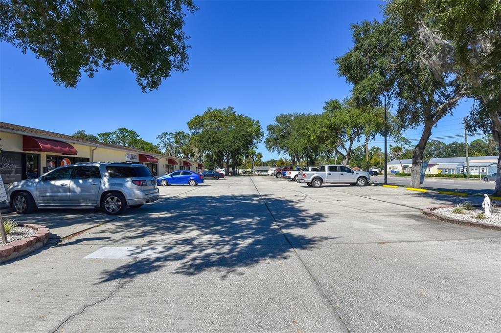 703 South State Street Bunnell, FL 32110 - Photo 12 of 25 a car parked in front of a building