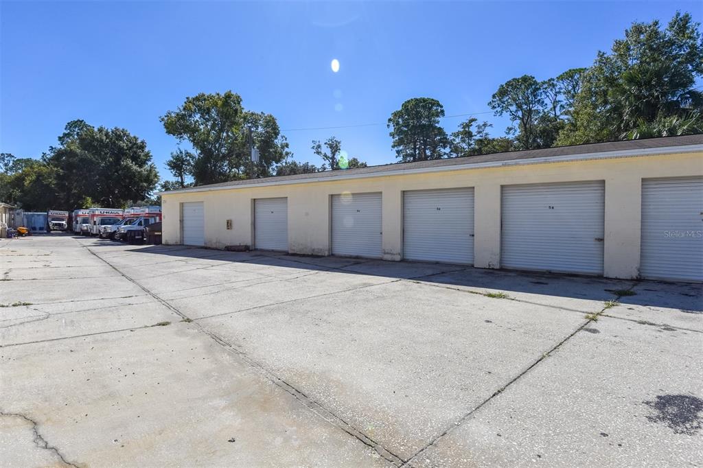 703 South State Street Bunnell, FL 32110 - Photo 14 of 25 front view of a house with a garage