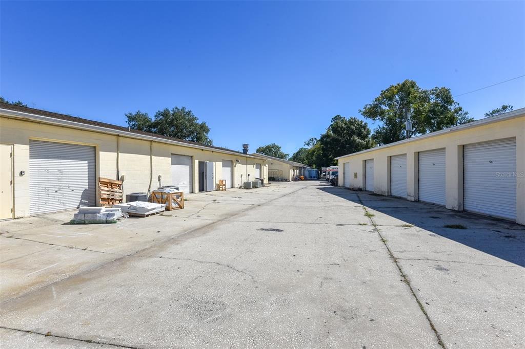 703 South State Street Bunnell, FL 32110 - Photo 17 of 25 a view of a house with backyard and sitting area